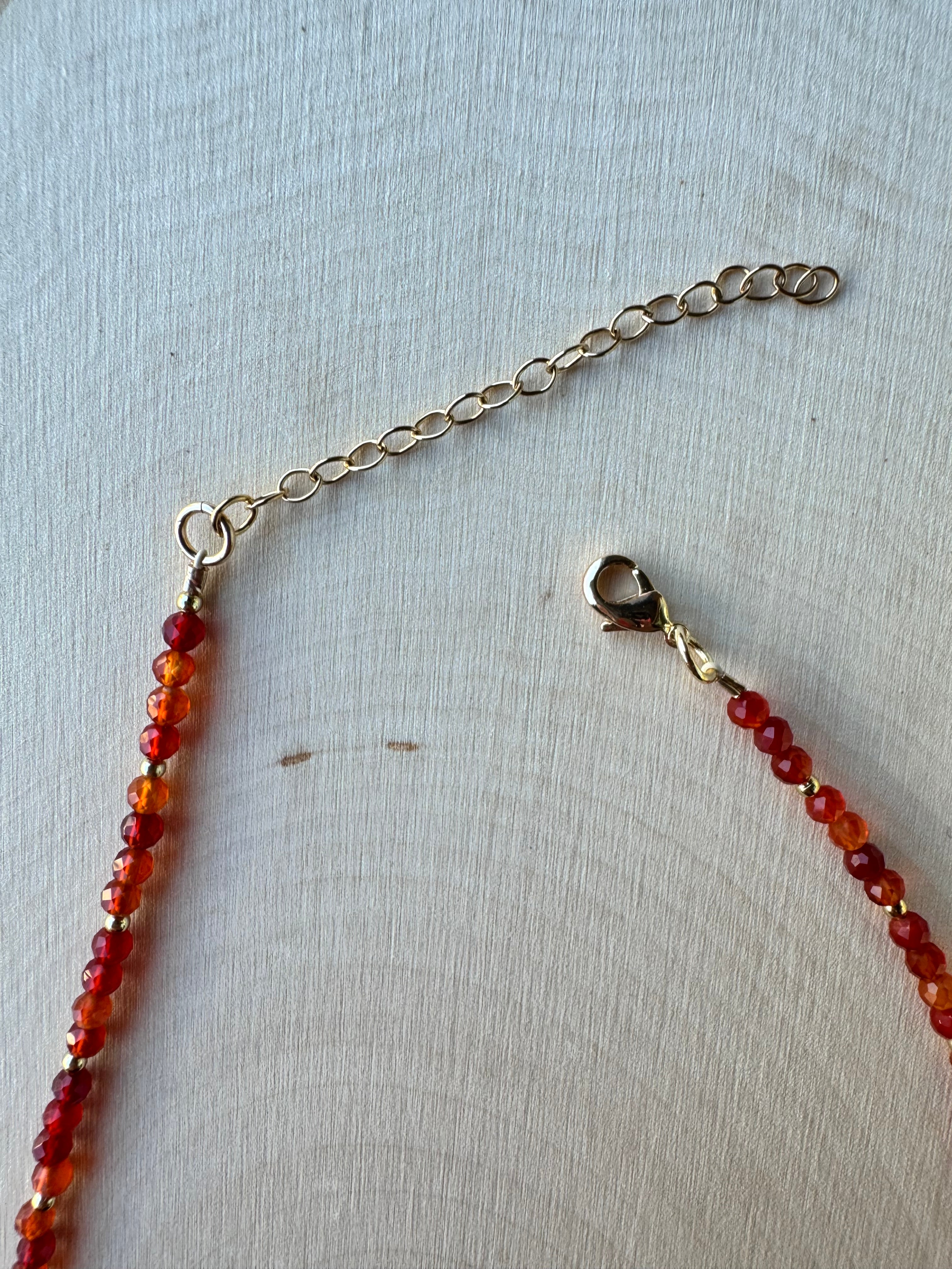 handmade beaded carnelian agate gemstone necklace with 14k gold filled findings, closeup of lobster clasp
