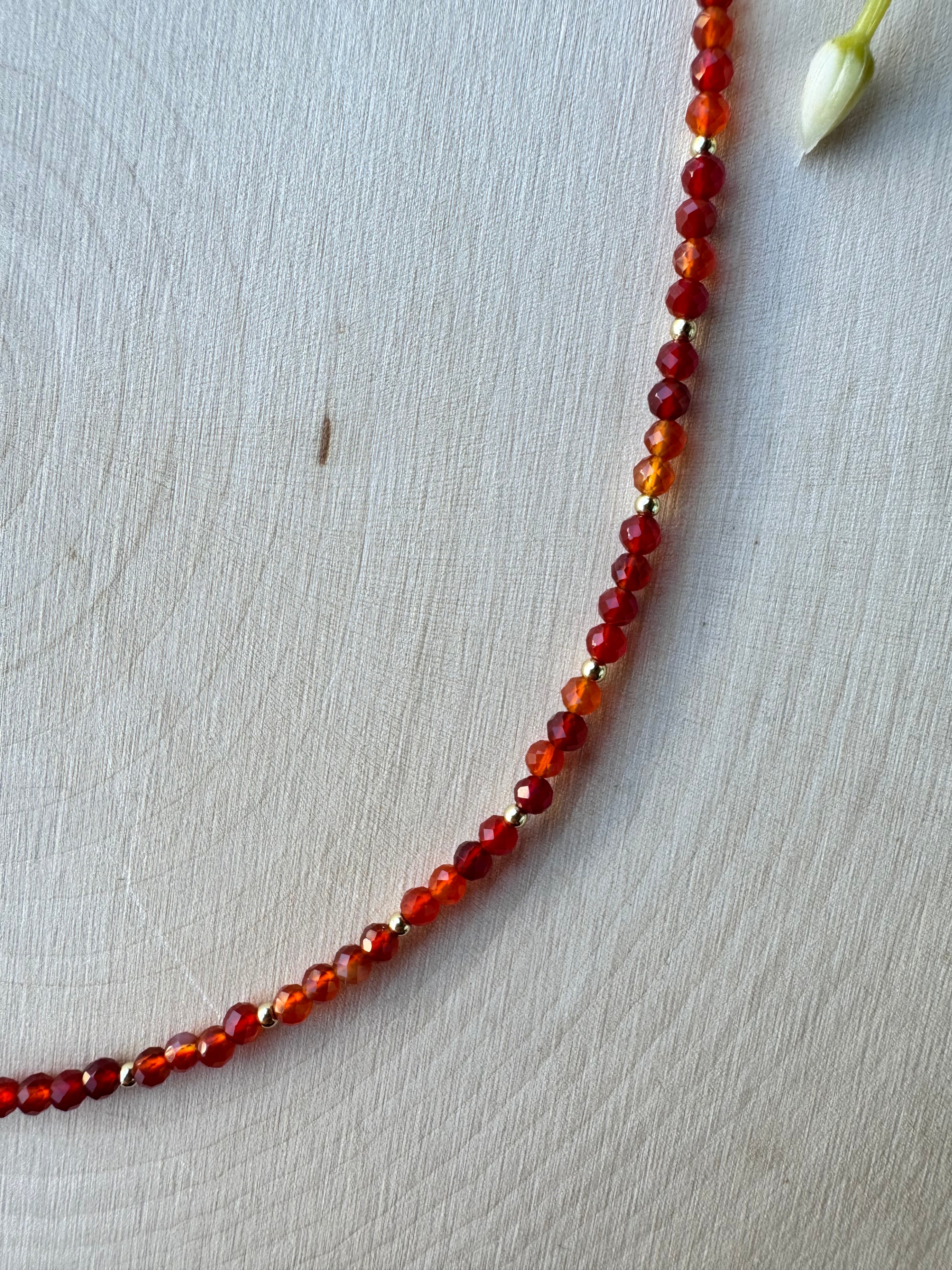 handmade beaded carnelian agate gemstone necklace with 14k gold filled findings, closeup of faceted beads