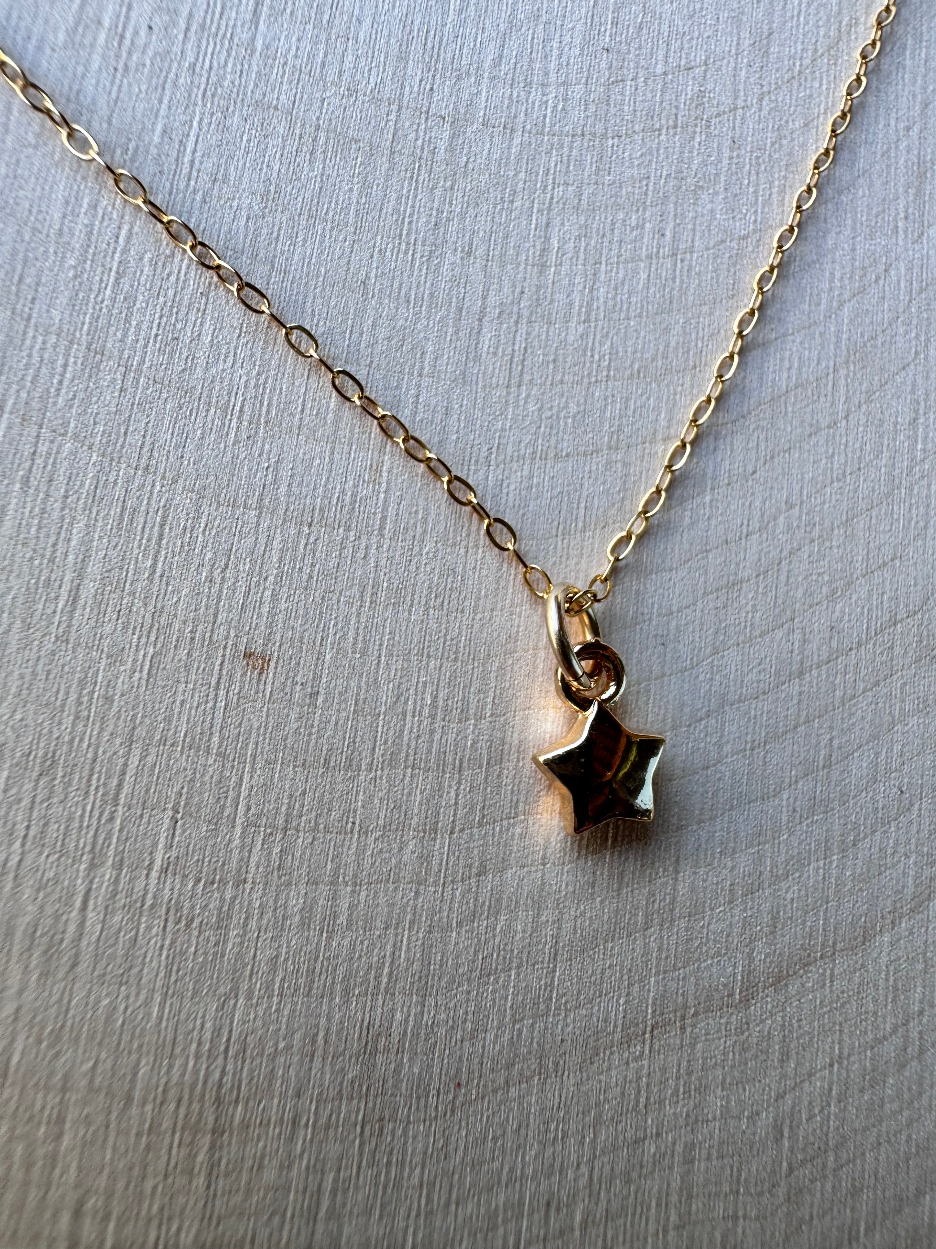 14k gold filled chain with 14k gold filled star charm, dainty necklace, closeup of star