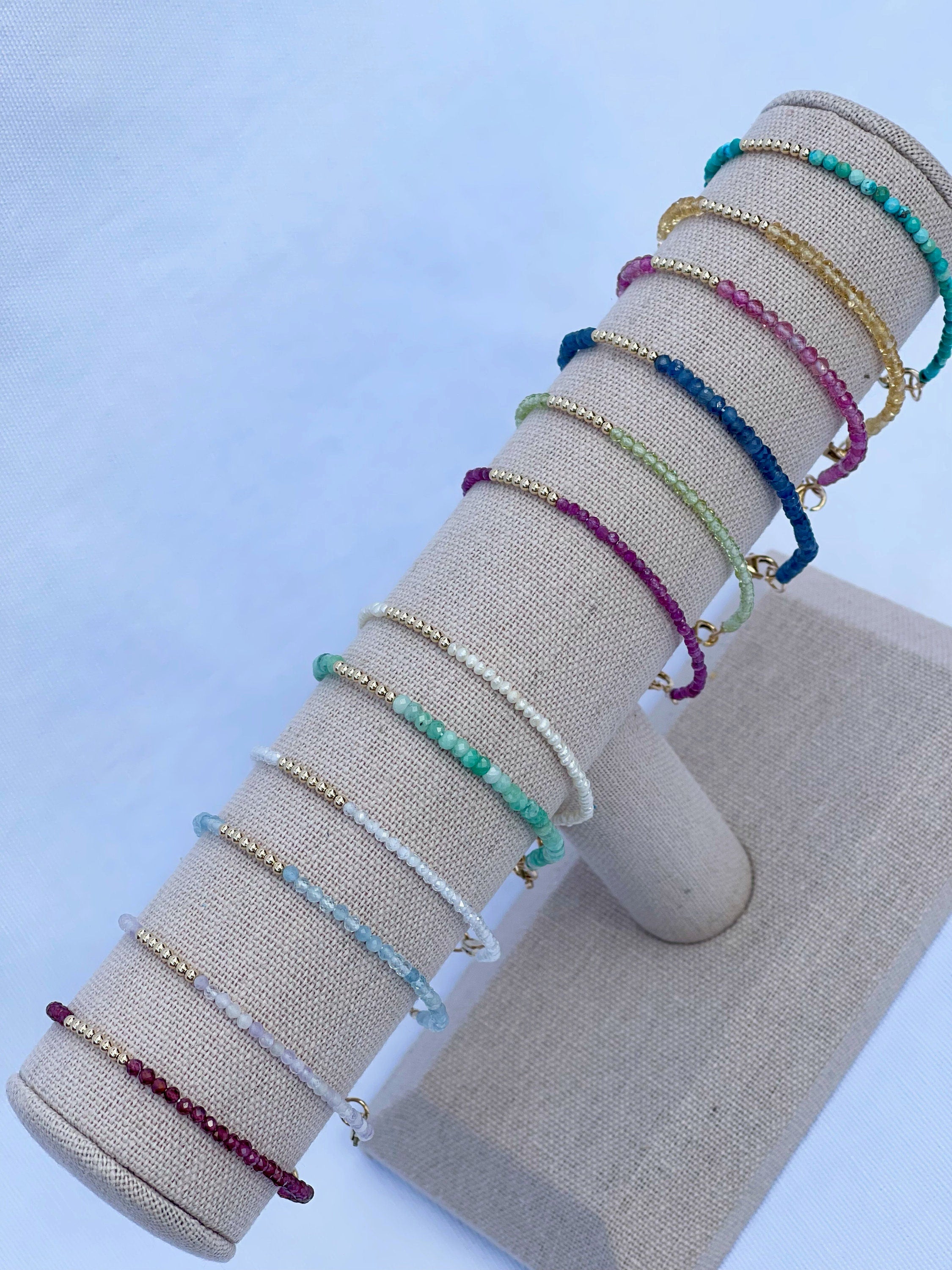 handmade birthstone gemstone bracelet collection. garnet, amethyst, aquamarine, cubic zirconia, emerald, pearl, ruby, peridot, sapphire, pink tourmaline, citrine and turquoise 