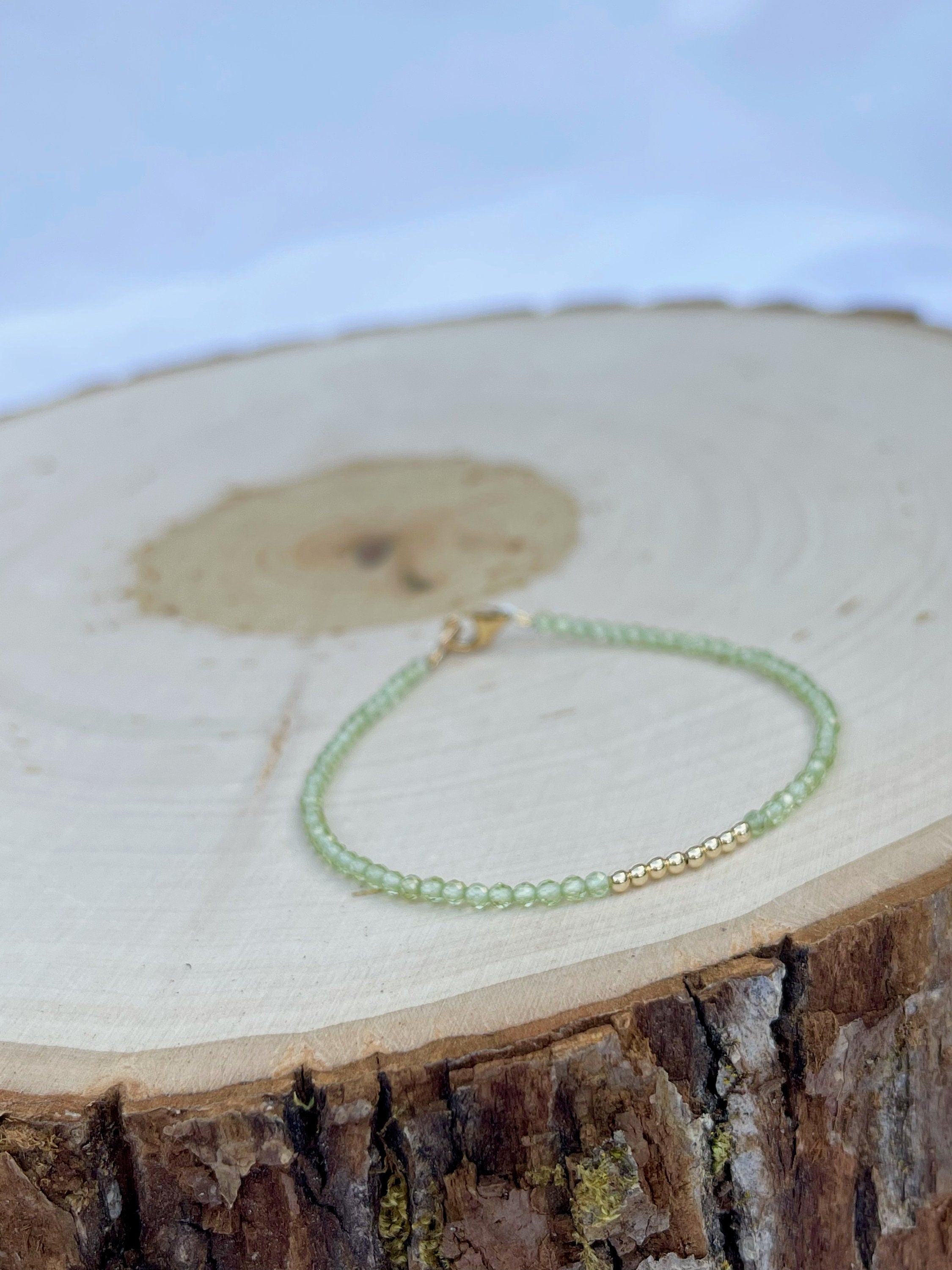 handmade peridot birthstone bracelet with 14k gold filled findings, side view 